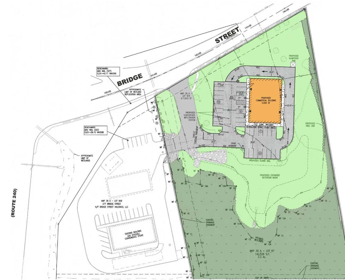Approved site plan showing the 5,850 SF building, parking and drive aisles off Bridge Street beside the existing gas station